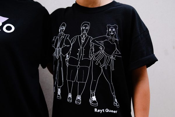 black t shirts with white line illustration on them of 3 queer people