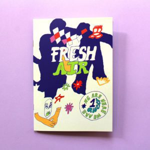 An A5 zine with a cream cover sits on a lilac surface. The cover is covered in a flowing line drawing with blue, lime and yellow fill that seems to depict two abstract figures,