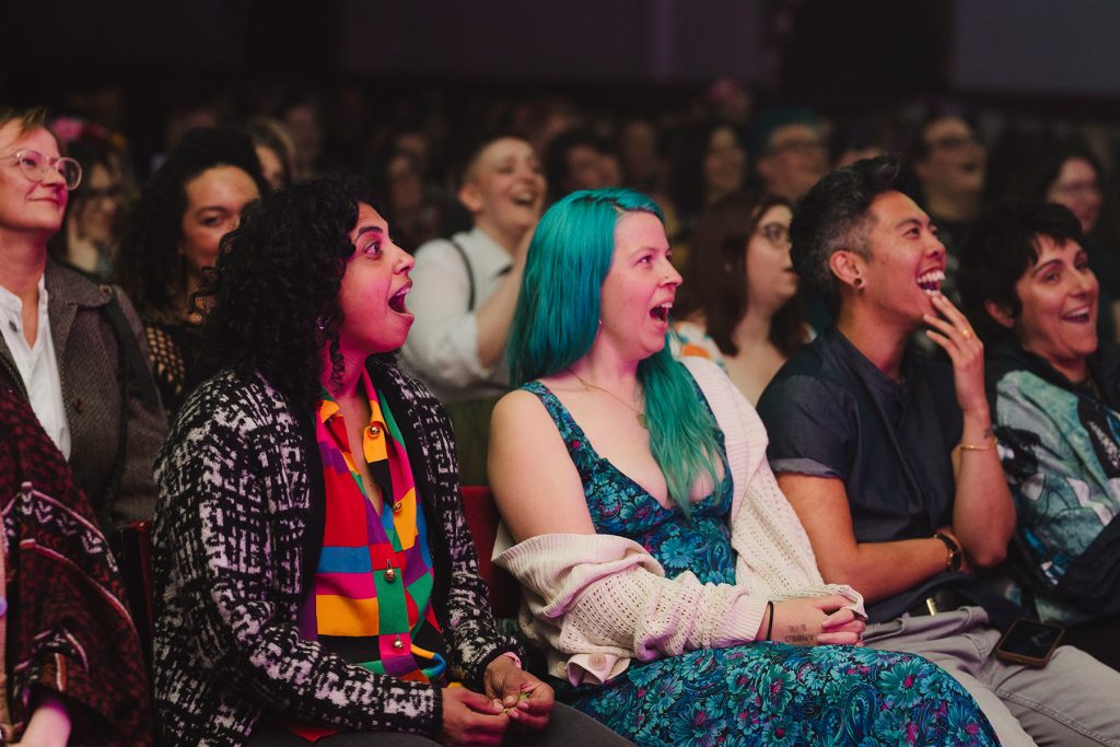 Audience exclaims with eyes wide open